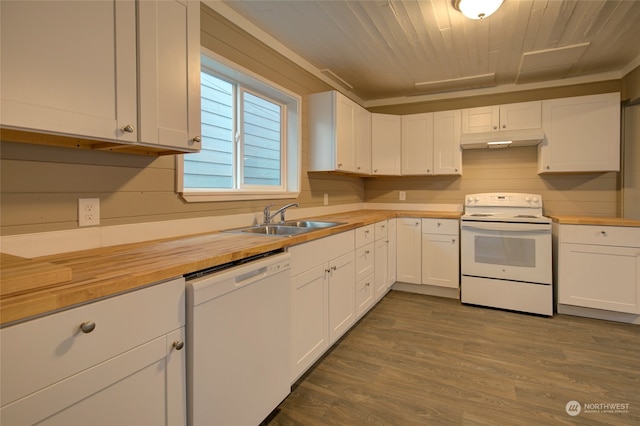 kitchen with white cabinets, sink, and white appliances