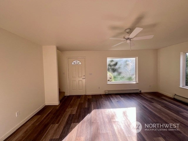 foyer featuring dark hardwood / wood-style floors, a baseboard radiator, and ceiling fan