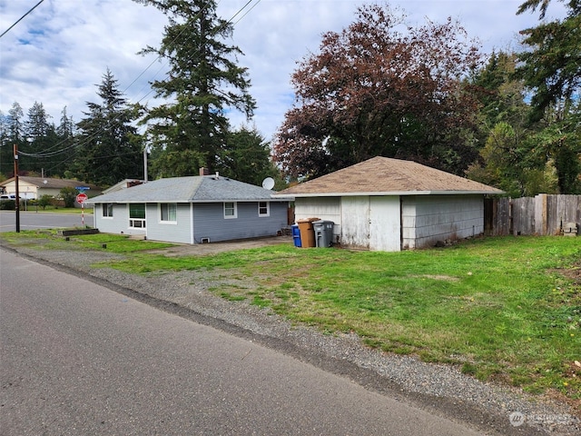 exterior space featuring a front lawn