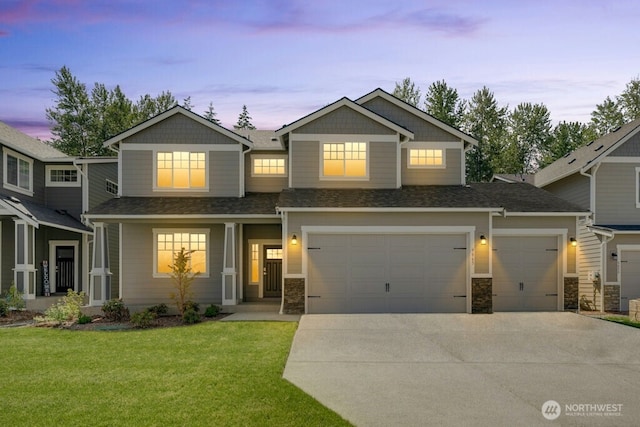 9865 Merrick St SE Unit 384, Yelm, WA 98597 - craftsman inspired home featuring concrete driveway, a front yard, a shingled roof, and stone siding
