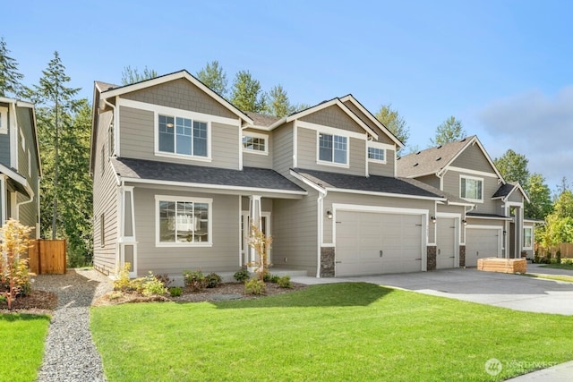 9865 Merrick St SE Unit 384, Yelm, WA 98597 - craftsman-style house with a garage, driveway, and a shingled roof