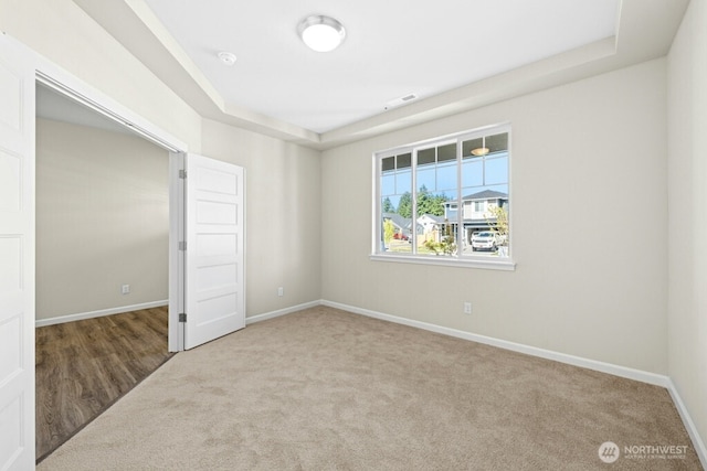 9865 Merrick St SE Unit 384, Yelm, WA 98597 - carpeted spare room with a tray ceiling and a smoke detector