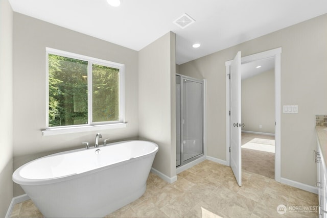 9865 Merrick St SE Unit 384, Yelm, WA 98597 - bathroom with a freestanding tub, a shower stall, vanity, and recessed lighting
