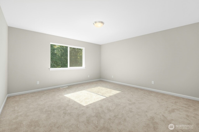 9865 Merrick St SE Unit 384, Yelm, WA 98597 - carpeted empty room featuring baseboards