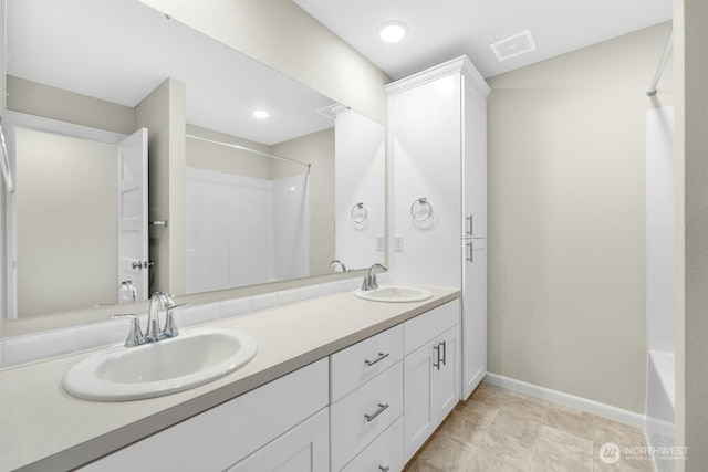 9865 Merrick St SE Unit 384, Yelm, WA 98597 - bathroom featuring double vanity and baseboards