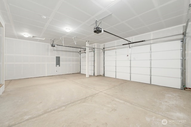 9865 Merrick St SE Unit 384, Yelm, WA 98597 - garage featuring electric panel and a garage door opener