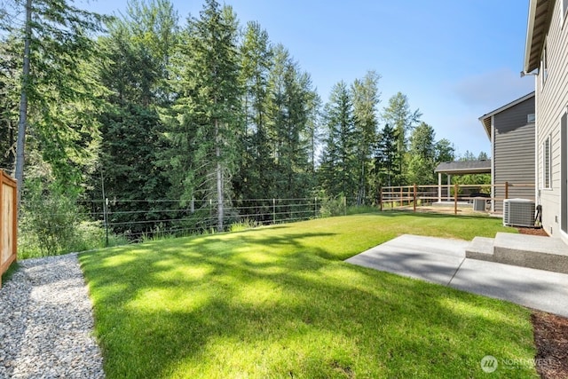9865 Merrick St SE Unit 384, Yelm, WA 98597 - fenced backyard featuring a patio