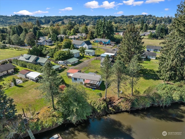 drone / aerial view with a water view