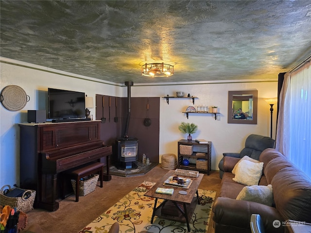 living room featuring carpet flooring, a wood stove, a textured ceiling, and ornamental molding