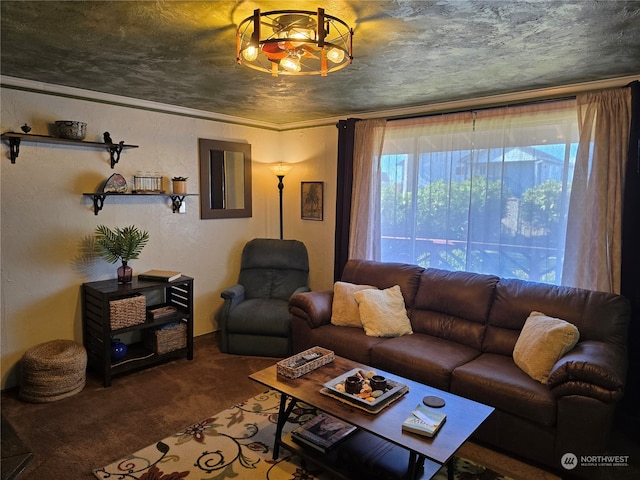 living room with crown molding, a textured ceiling, and carpet floors