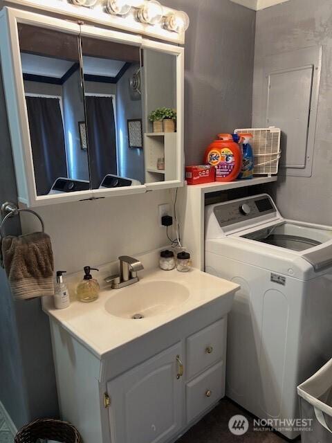 61 Salt Air St, Clallam Bay, WA 98326 - bathroom with washer / dryer and vanity