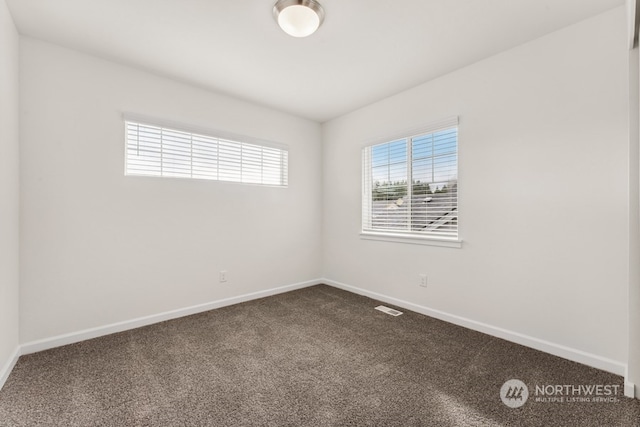 empty room with carpet floors