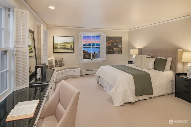 carpeted bedroom with a baseboard heating unit and ornamental molding