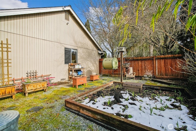 view of yard layered in snow