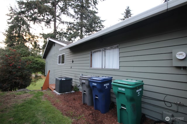 view of property exterior with central AC unit