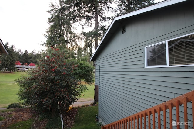 view of home's exterior featuring a yard