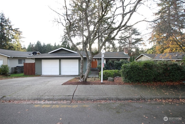 single story home with a garage