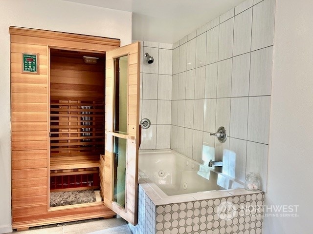 bathroom with shower with separate bathtub