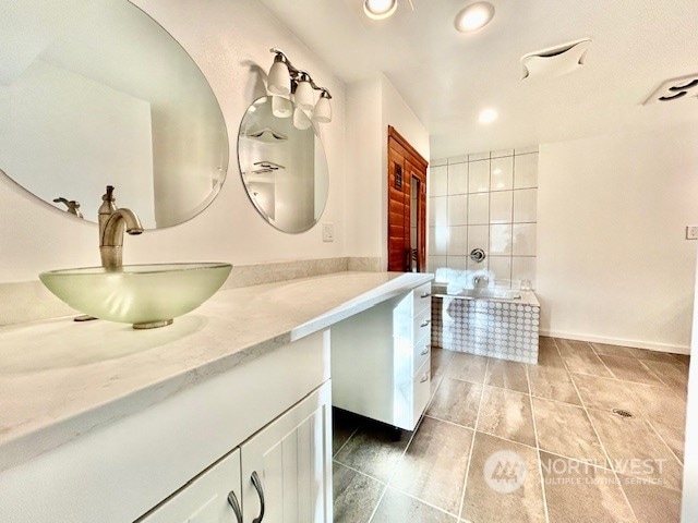 bathroom featuring vanity