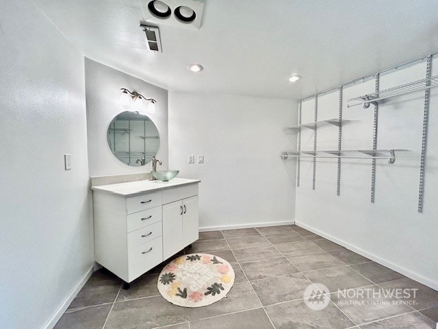 bathroom featuring vanity and tile patterned floors