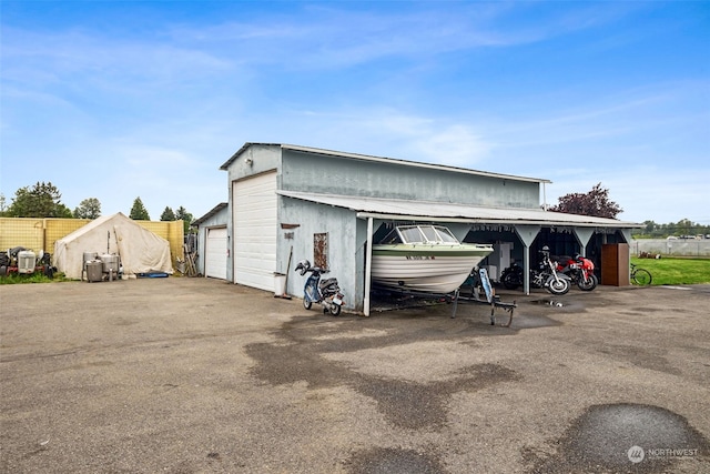 view of outbuilding with a garage