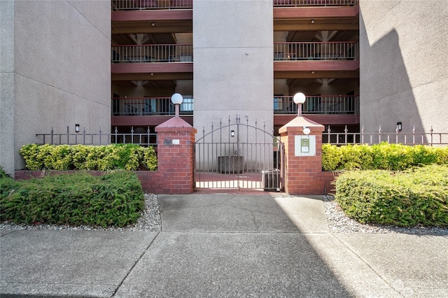 exterior space with central AC unit and a balcony