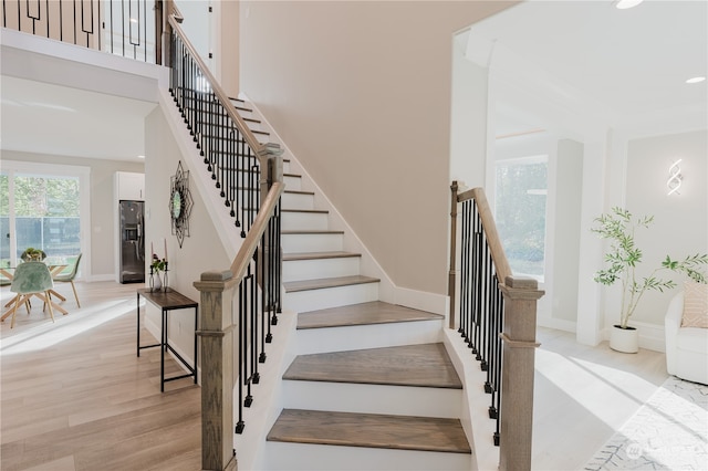 staircase featuring hardwood / wood-style floors