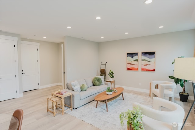 living room with light hardwood / wood-style flooring