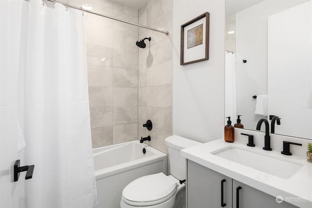 full bathroom featuring toilet, shower / tub combo, and vanity