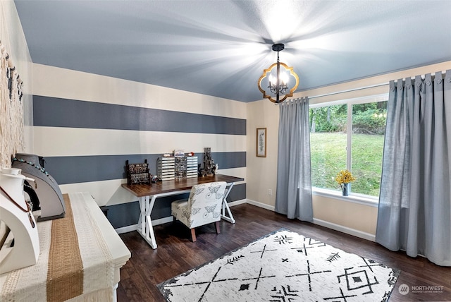 home office featuring a notable chandelier and dark hardwood / wood-style flooring