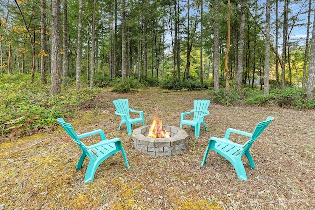 view of patio with a fire pit