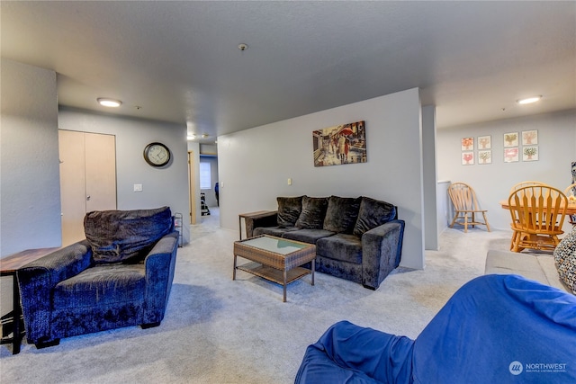 living room with light colored carpet