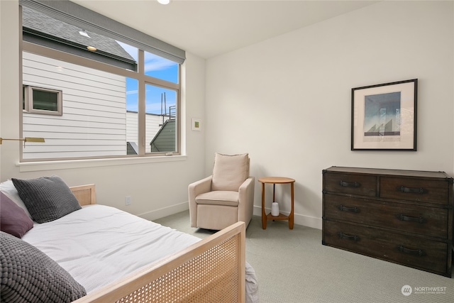 bedroom with light colored carpet