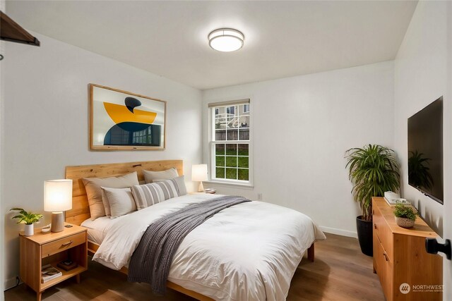 27705 23rd Ave S, Federal Way, WA 98003 - bedroom with baseboards and wood finished floors