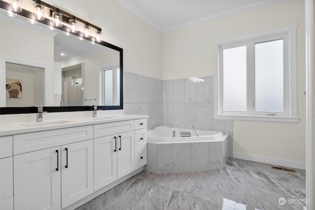 bathroom featuring vanity, crown molding, tile walls, and tiled bath