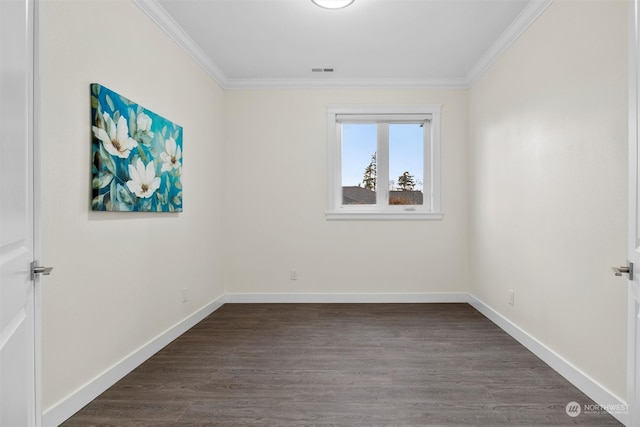 unfurnished room featuring crown molding and dark hardwood / wood-style flooring