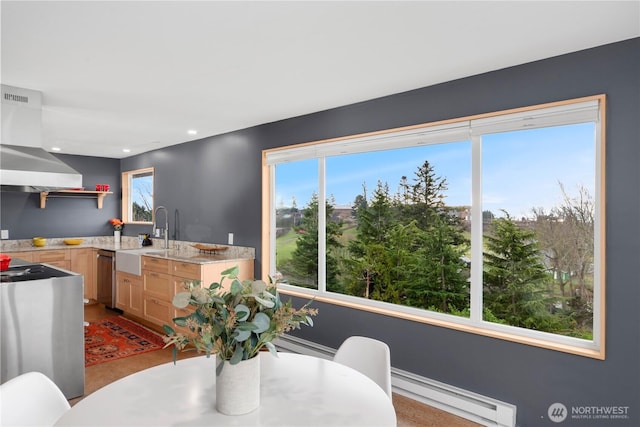 dining room featuring a baseboard heating unit, recessed lighting, and visible vents