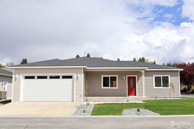 ranch-style home featuring a front yard, central AC unit, and a garage