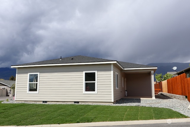 view of home's exterior featuring a yard