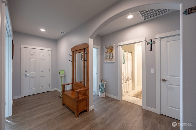 foyer with light hardwood / wood-style floors