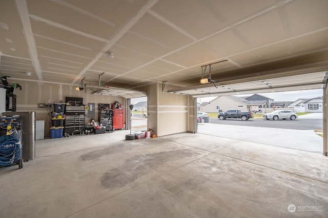 garage featuring a carport