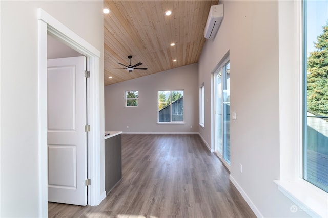 hall with light hardwood / wood-style floors, wooden ceiling, vaulted ceiling, and a wall mounted air conditioner