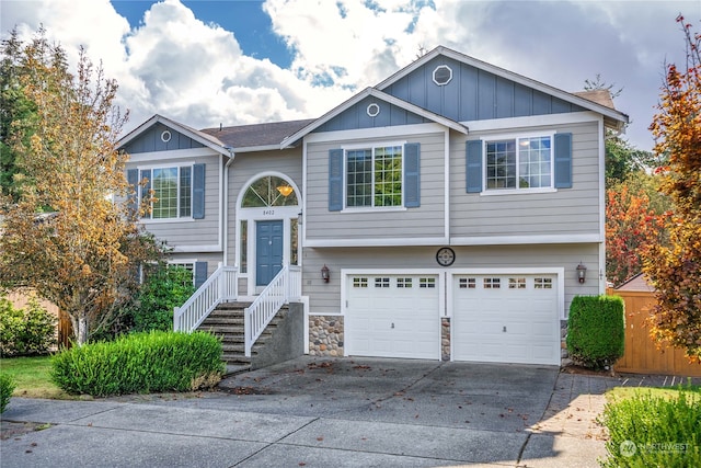 raised ranch featuring a garage