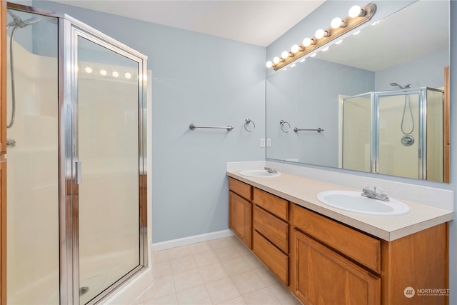 bathroom featuring vanity and walk in shower