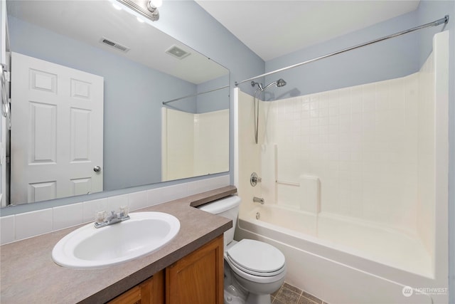 full bathroom with vanity, shower / washtub combination, toilet, and tile patterned floors