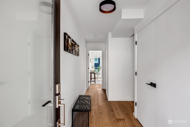 hall featuring light hardwood / wood-style flooring