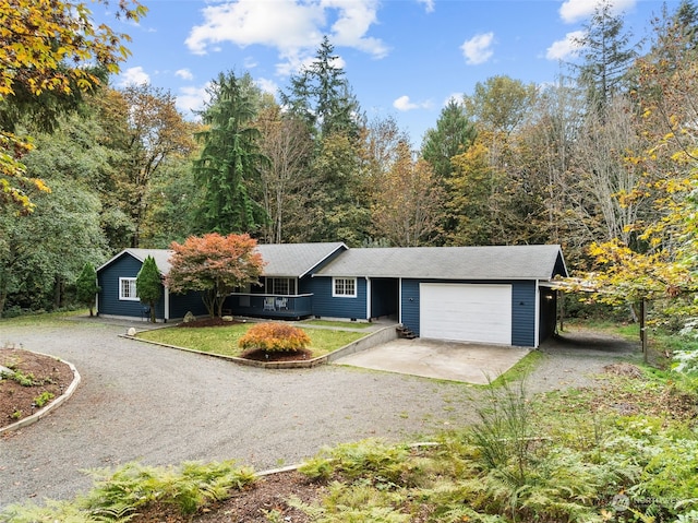 ranch-style home featuring a garage