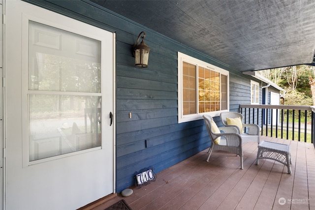 wooden terrace with covered porch