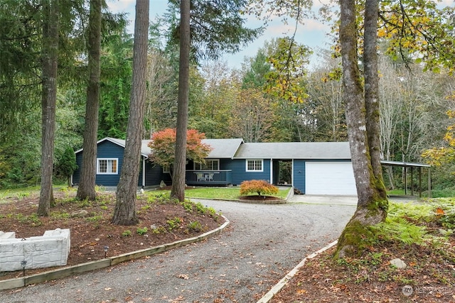 ranch-style house featuring a garage