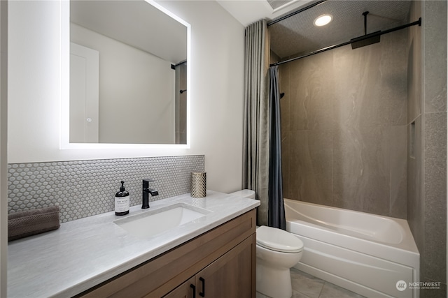 full bathroom featuring vanity, toilet, shower / tub combo, and tile patterned flooring